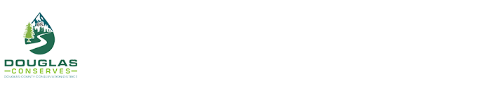 Logo of Douglas Conserves, featuring a mountain and tree design, emphasizing environmental conservation and sustainability initiatives.